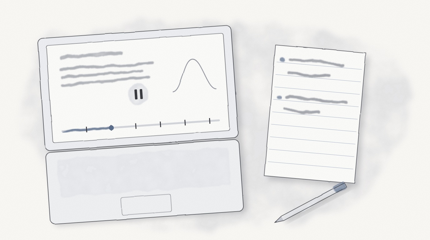 An open laptop with a lecture video paused, small marks along its progress bar, beside a notebook with two short lines written after each stop and a pen.